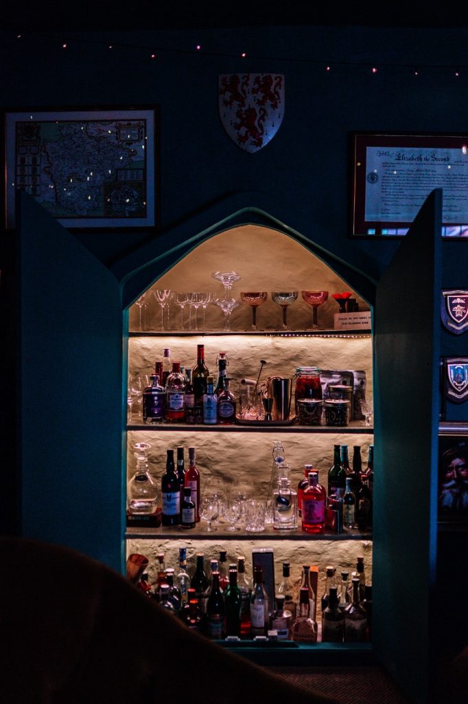 Hidden bar in a warm and sophisticated snug