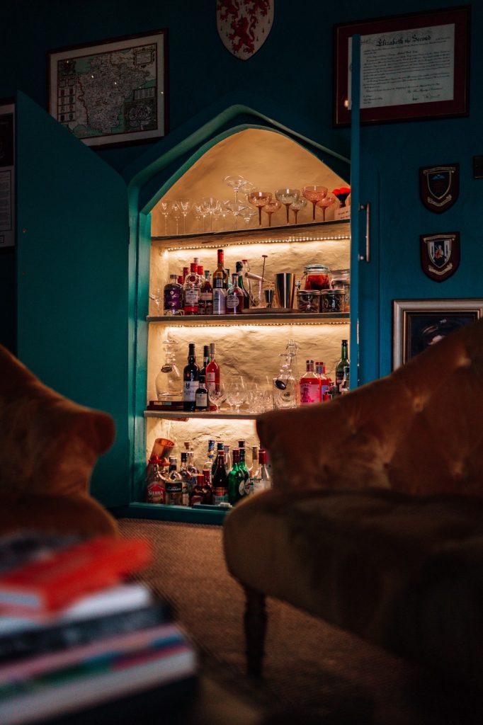 The hidden bar open in a warm and sophisticated snug